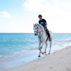 Horse Riding On The Beach